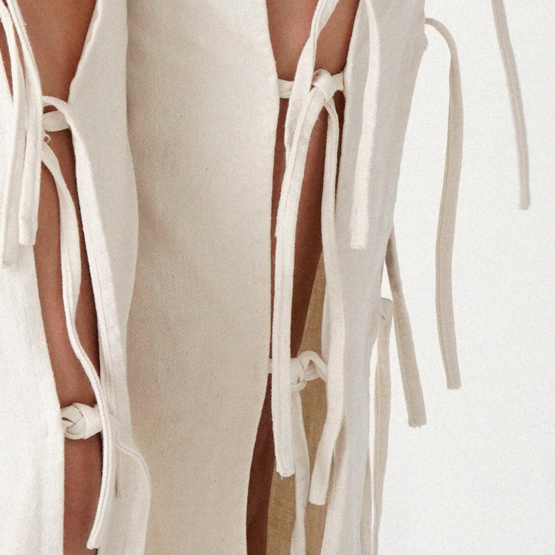 pantalón tiras cortas, nudos y secretos