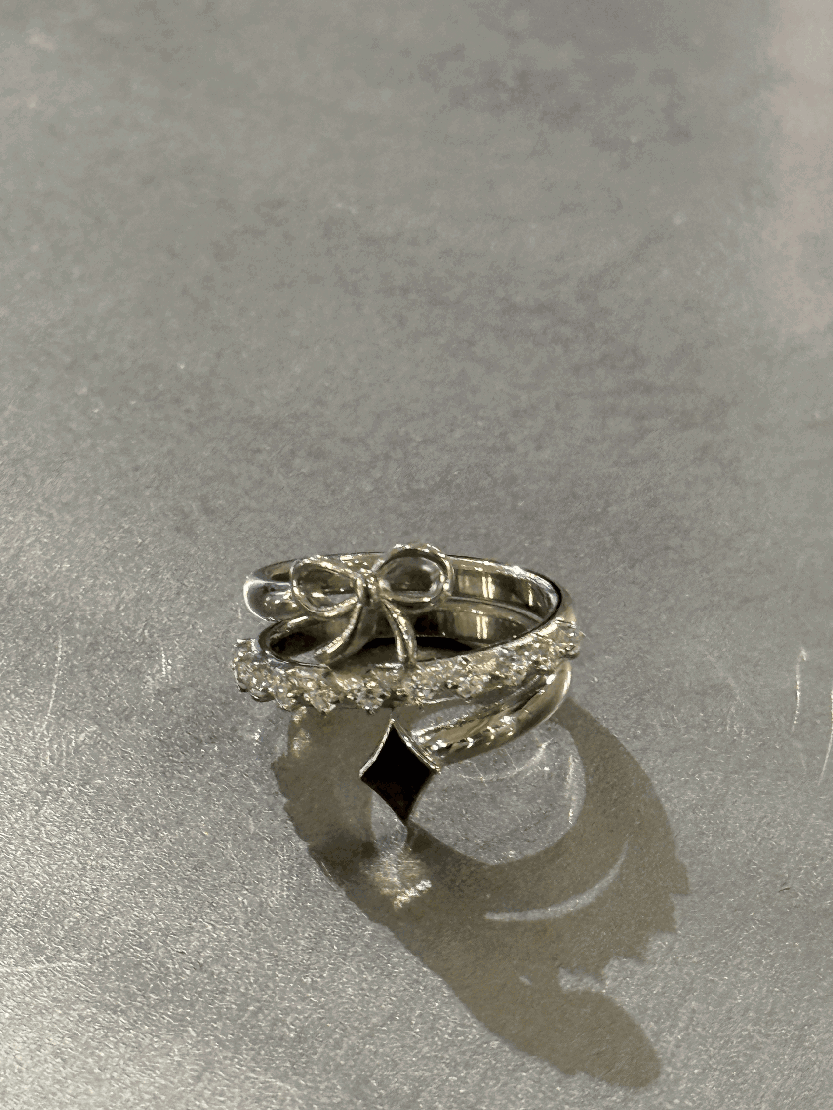 TRIPLE SPIRAL BOW RING