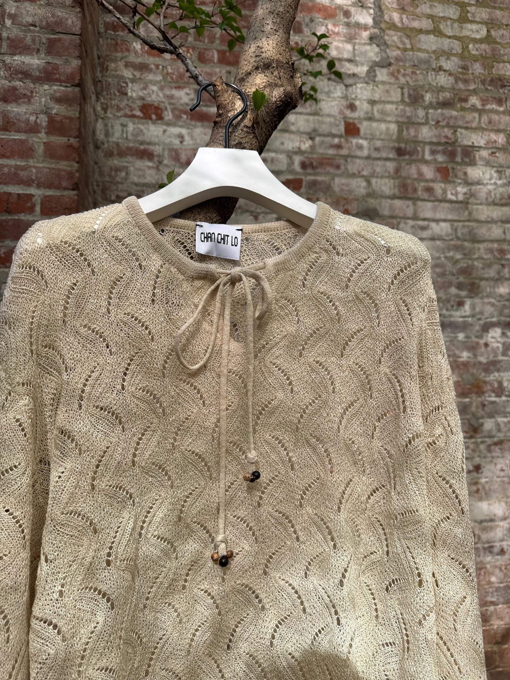 RIPPLE LACE STITCH WOOD BEAD TIE UP SWEATER