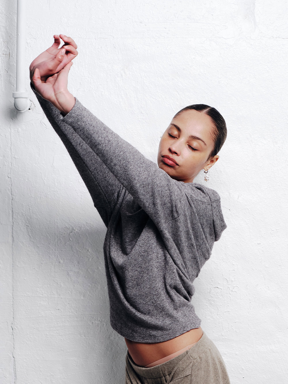 ASYMMETRICAL WOOL BLEND SWEATER IN GREY